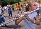 ChapmanBand1 FIN  Heather Hawkins, front right, an 11th grader at Chapman High School, plays the flute, along with other Chapman High School Marching Band members, as they practice marching at the school in Inman Monday afternoon, 5-17-04. The band will be traveling to Washington, D.C. to perform for the WWII dedication ceremony parade on Memorial Day.