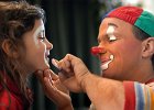 Clownfun--FIN  Gabor Hrisafis, a professional clown with the Ringling Bros. and Barnum &#38; Bailey circus, right, puts clown make-up on deaf student Kelli Jane Barnes, 5, of Spartanburg, left, as he performed for about 40 students in the blind and deaf schools at the South Carolina School for the Deaf and Blind in Spartanburg, SC Thursday afternoon, 1-29-04. The circus is showing at the Bi-Lo Center in Greenville Jan.28 through Feb.1. Hrisafis, originally from Budapest, Hungary, has been performing with Ringling for five years. (AP Photo/Spartanburg Herald-Journal/Tim Kimzey).  The clown obviously loved his job, and i could never see him as a &#34;sad&#34; clown. His joy and the gleam in the eyes of the children he was entertaining was heart-warming. Having to work a lot of depressing news events makes you feel grateful to photograph the happy times all the more, and i am sure that readers enjoy seeing them too.
