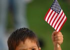 PledgeFlagKid--FIN  Emmett Zacharias, 4, of Spartanburg, waves his flag as he holds his hand over his heart to the playing of &#34;The Star Spangled Banner&#34; by the Charlotte Symphony Orchestra, during the 10th annual Red, White, &#38; Boom at Barnet Park in downtown Spartanburg Wednesday evening, 6-29-05.