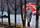 RainyWalkUmbrellaTrees FIN  David Means trys to keep warm and dry as he walks in the rain along Union Street in Spartanburg, SC Tuesday afternoon, 3-16-05. Means was on his way to the bank. (AP Photo/Spartanburg Herald-Journal/Tim Kimzey)