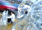 icesculpture.jpg  Kingdavahn Pathoumhong molds an ice sculpture in front of the Hong Thong Thai Cuisine restaurant at 330 W. Main St. He used a chain saw and an array of picks and chisels to make two swans in celebration of the restaurant&#39;s opening Tuesday night. Pathoumhong is the head chef and a co-owner of the business. The restaurant will be open seven nights a week.