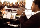 trumpet1.JPG  Irene Hamilton plays her trumpet at Mt.Sinai Baptist Church in Greenville Sunday, December 16, 2001. Hamilton received the trumpet after her nephew wrote into a radio show requesting the Christmas gift for her.