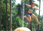 whalesplash  Marissa Keisler, 8, of Union, cools down from the afternoon heat while playing in the water spray of a whale at Foster Park  in Union, SC Thursday, June 27, 2002. (AP Photo/Spartanburg Herald-Journal/Tim Kimzey).